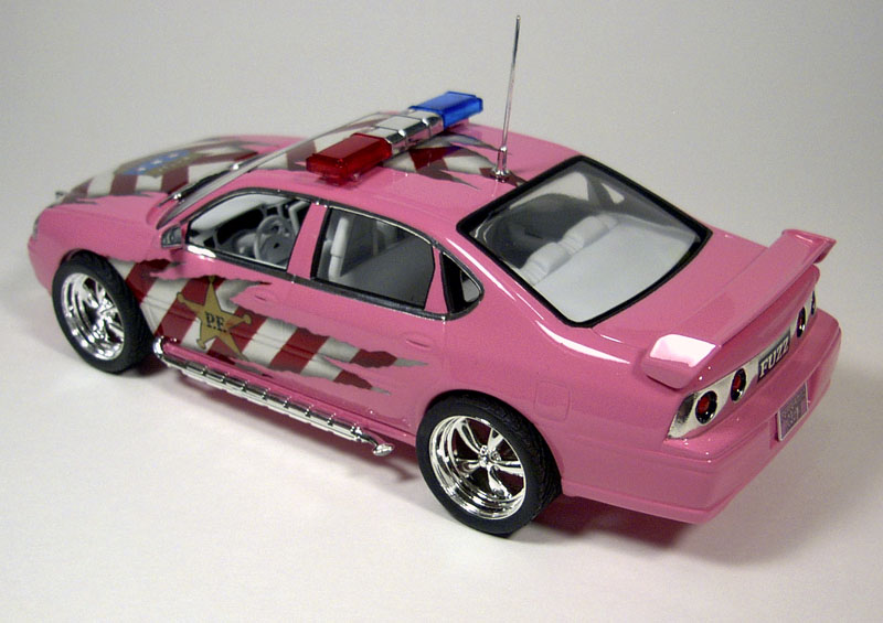 pink police car toy